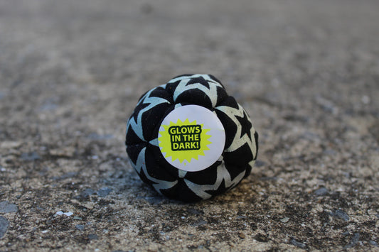 Static Glow footbag in blackwith glow-in-the-dark synthetic suede