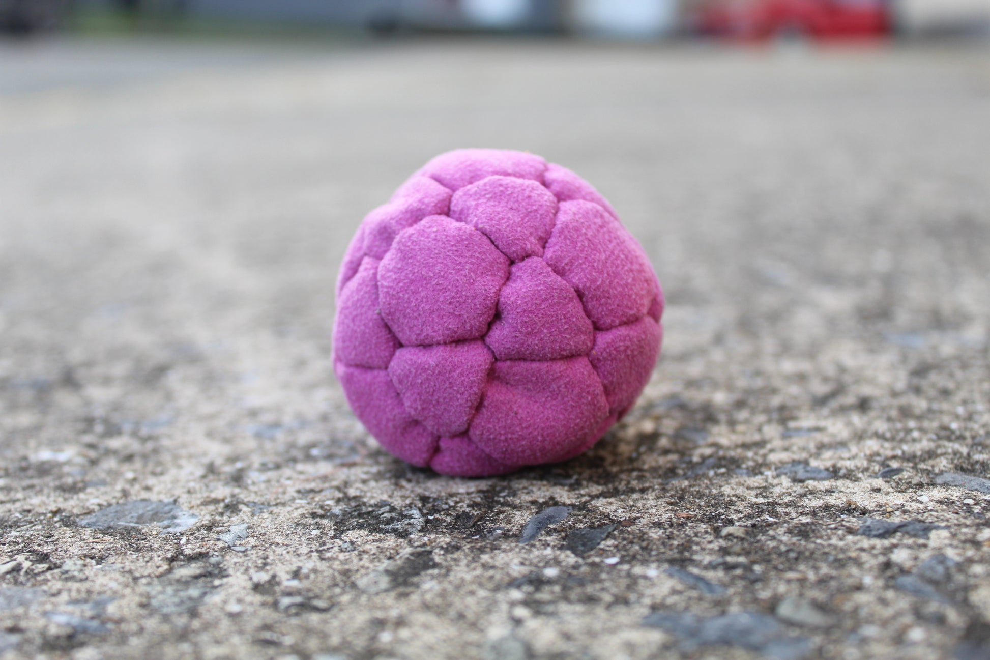 Xtremity Pro professional footbag with a 32 panel construction in Magenta