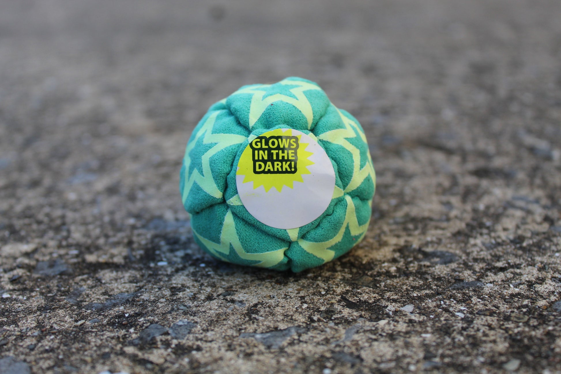 Static Glow footbag in green with glow-in-the-dark synthetic suede 