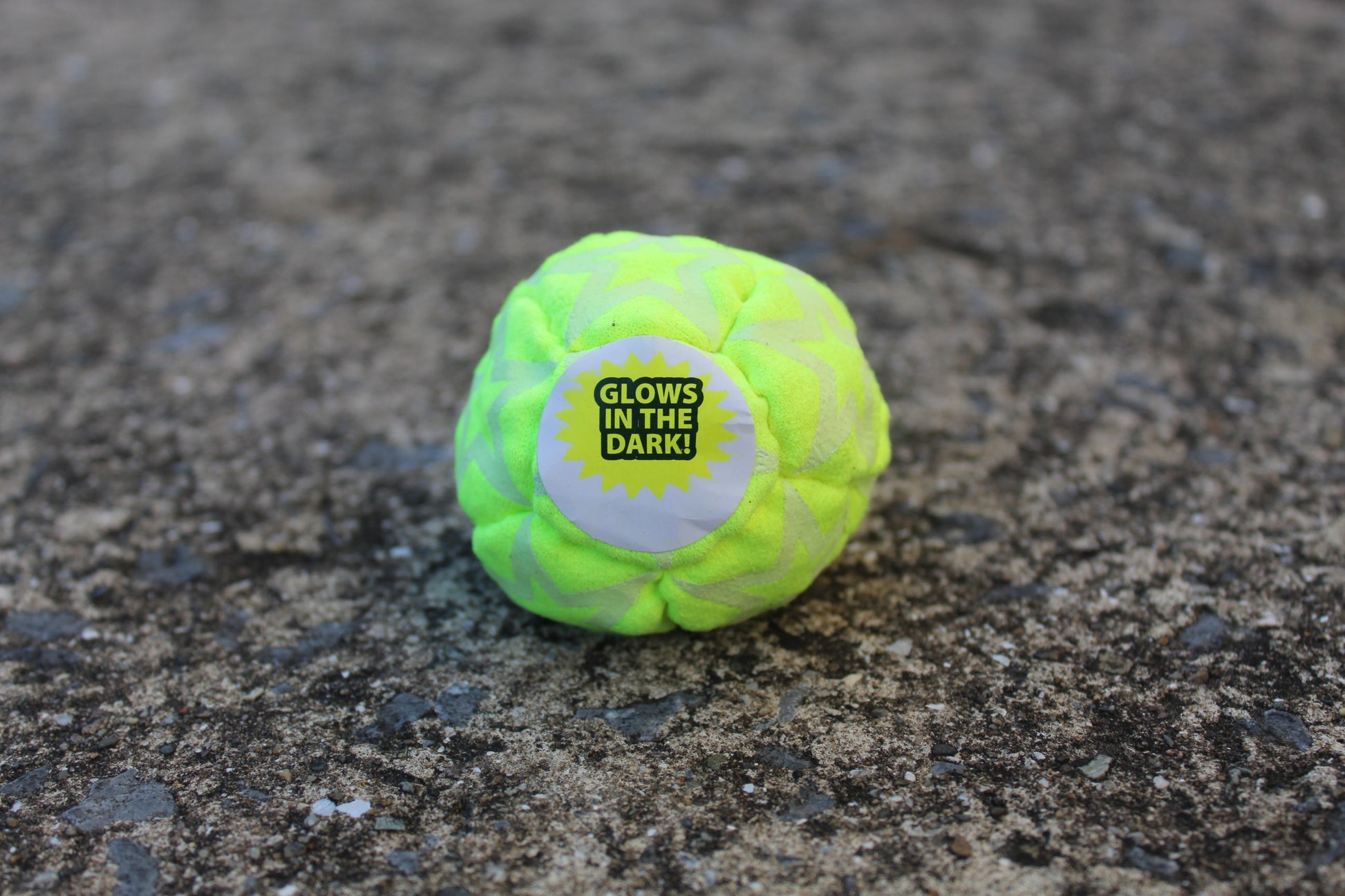 Static Glow footbag in bright yellow with glow-in-the-dark synthetic suede panels