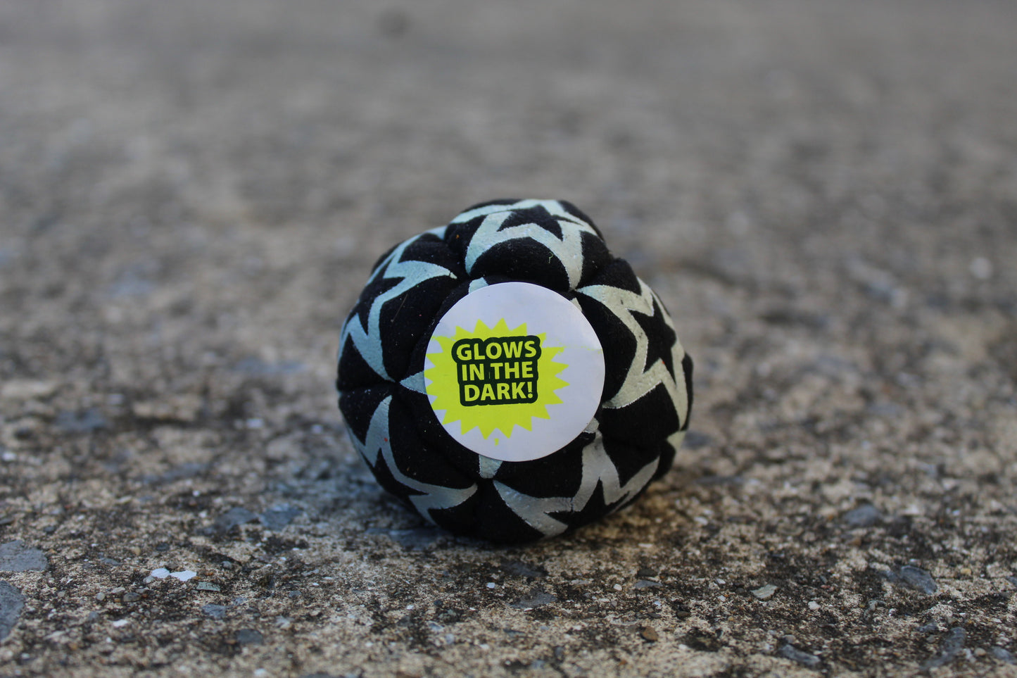Static Glow footbag in blackwith glow-in-the-dark synthetic suede 