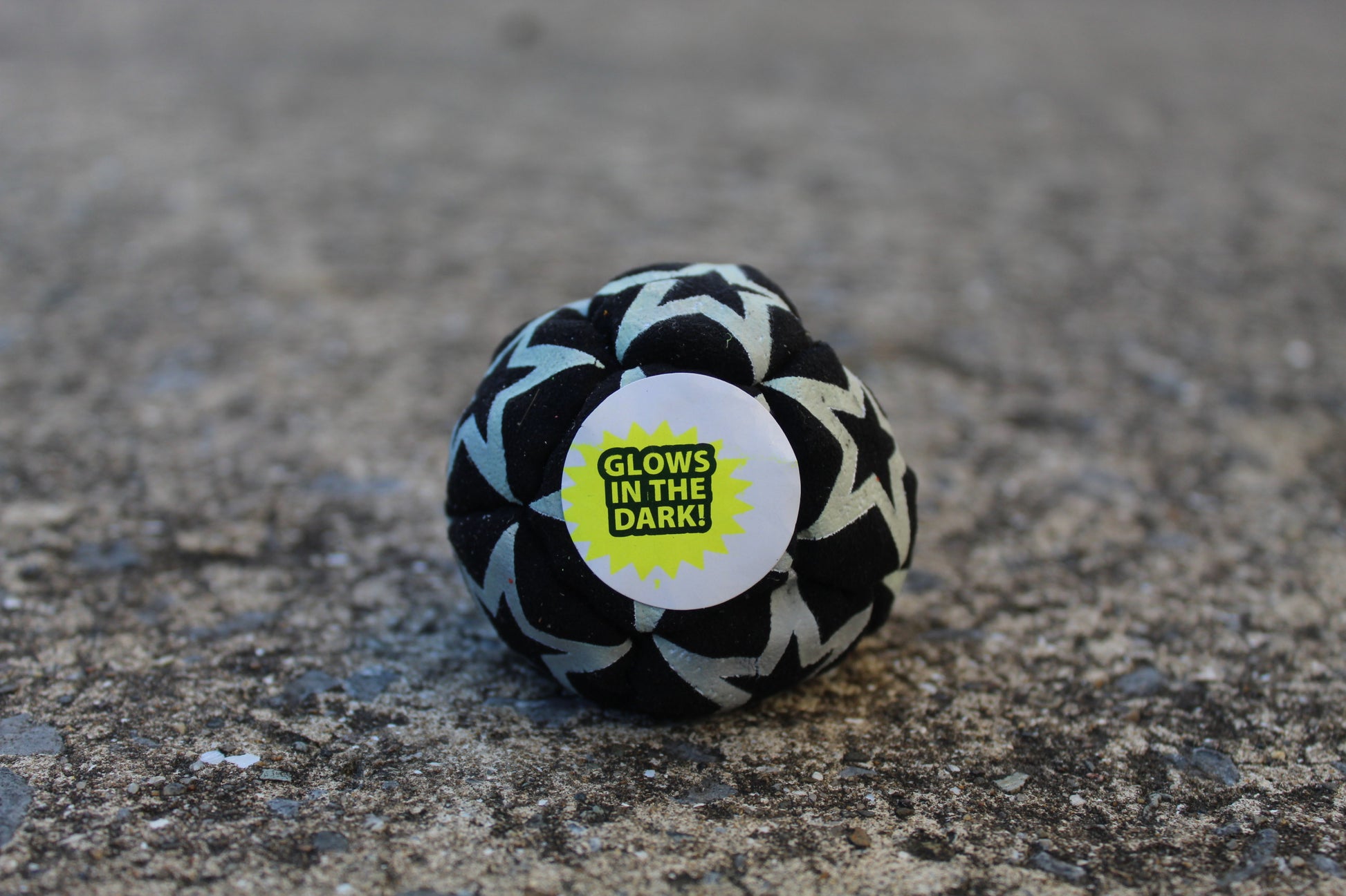 Static Glow footbag in blackwith glow-in-the-dark synthetic suede 